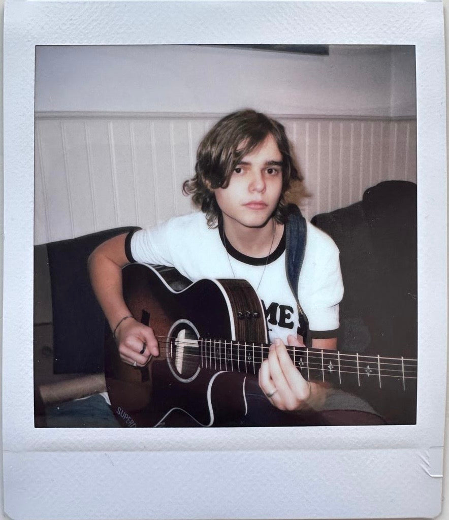 ONE UNIQUE SIGNED POLAROID PHOTO