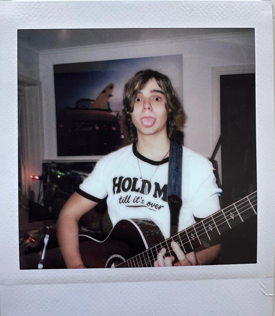 ONE UNIQUE SIGNED POLAROID PHOTO