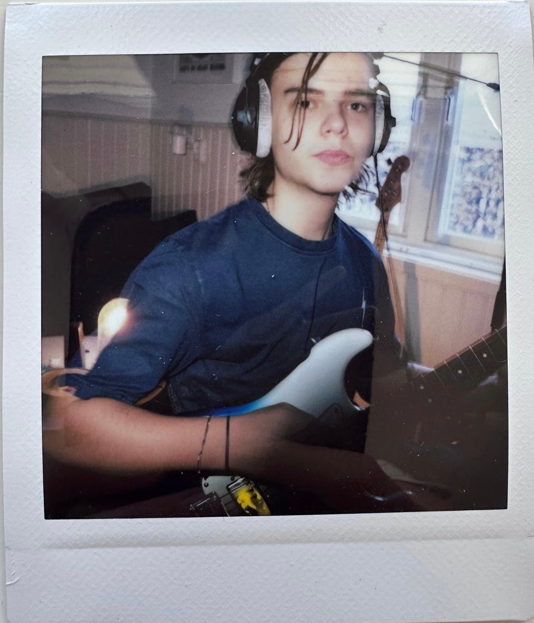 ONE UNIQUE SIGNED POLAROID PHOTO