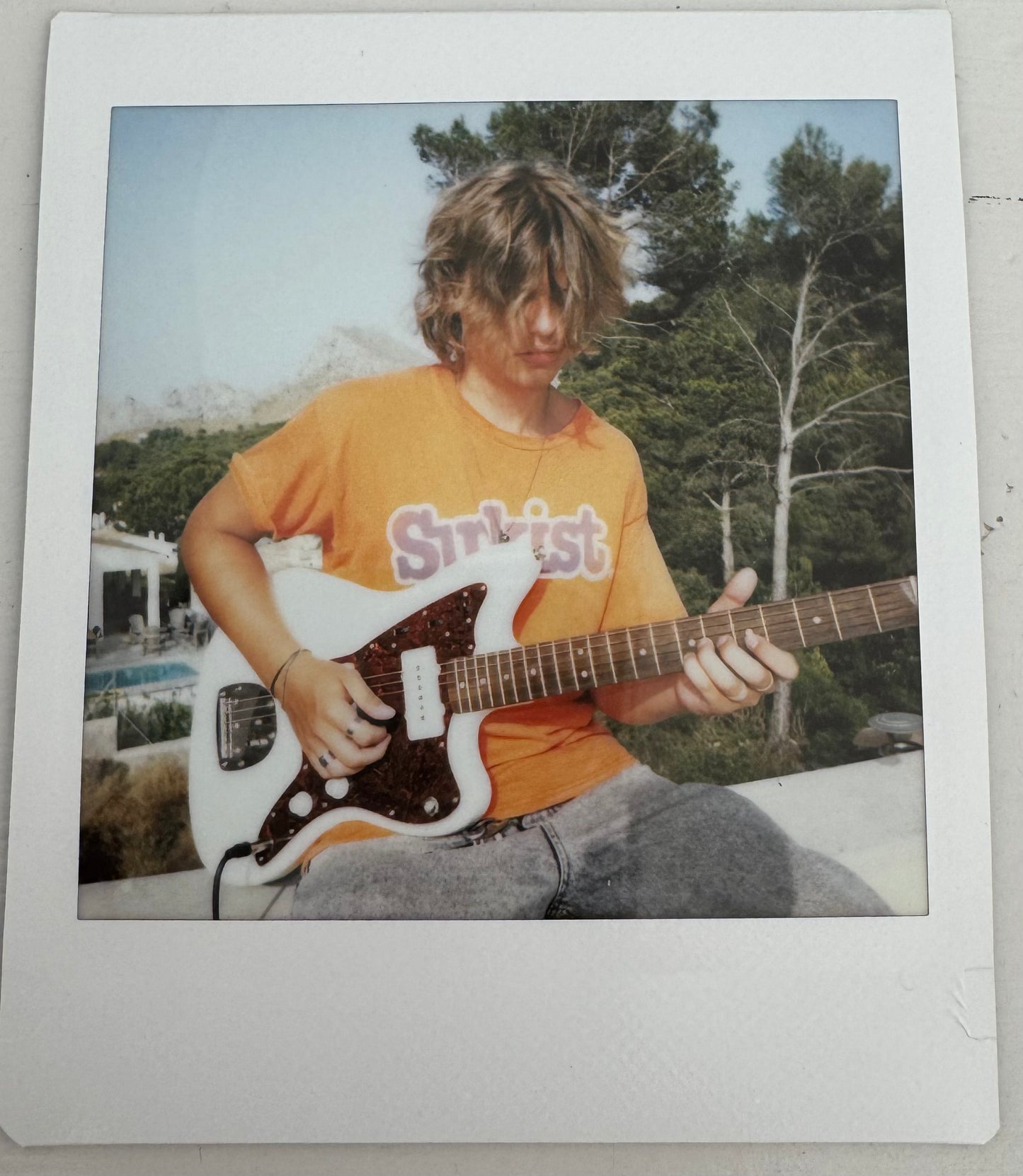 ONE UNIQUE SIGNED POLAROID PHOTO