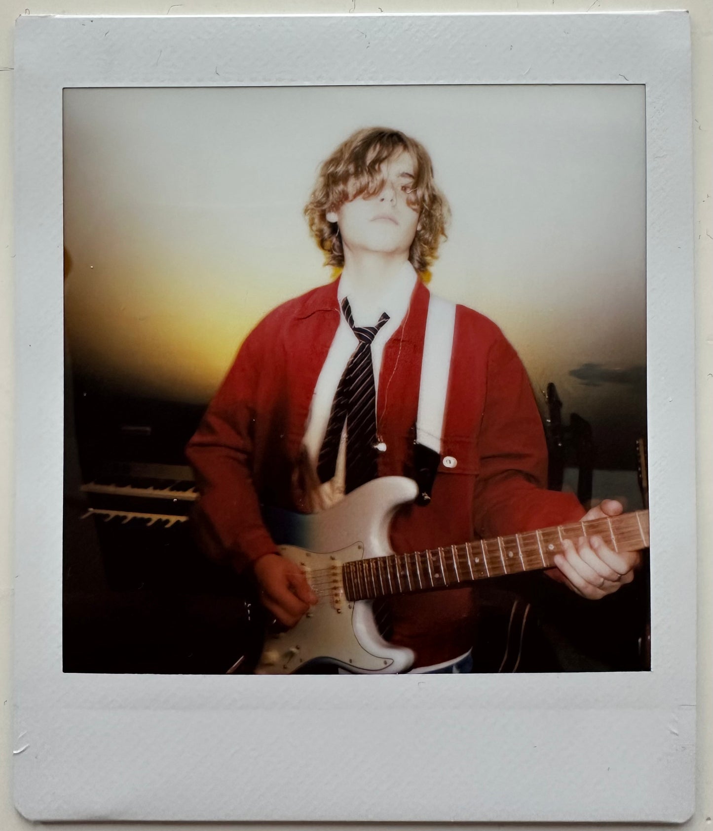 ONE UNIQUE SIGNED POLAROID PHOTO