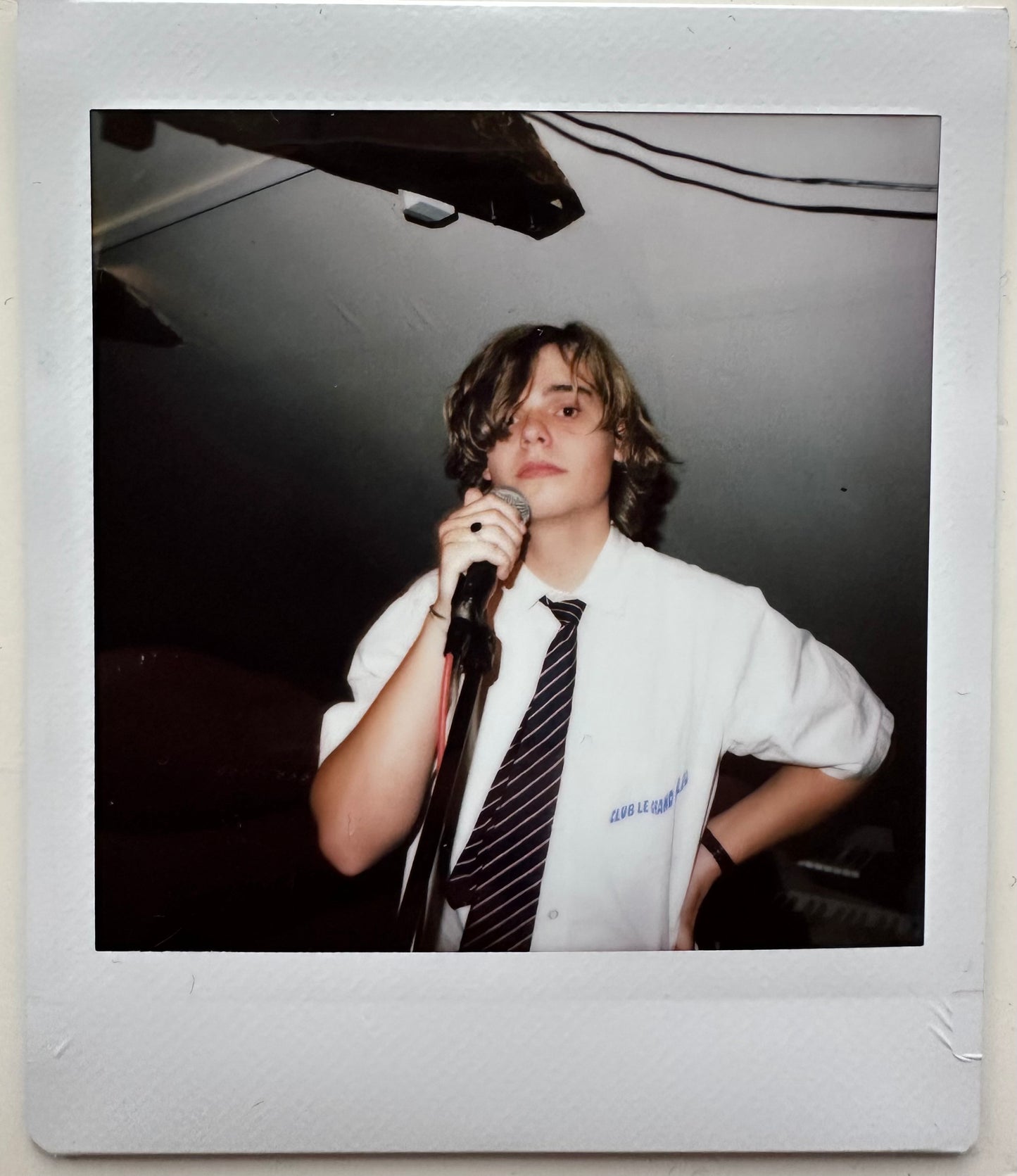 ONE UNIQUE SIGNED POLAROID PHOTO