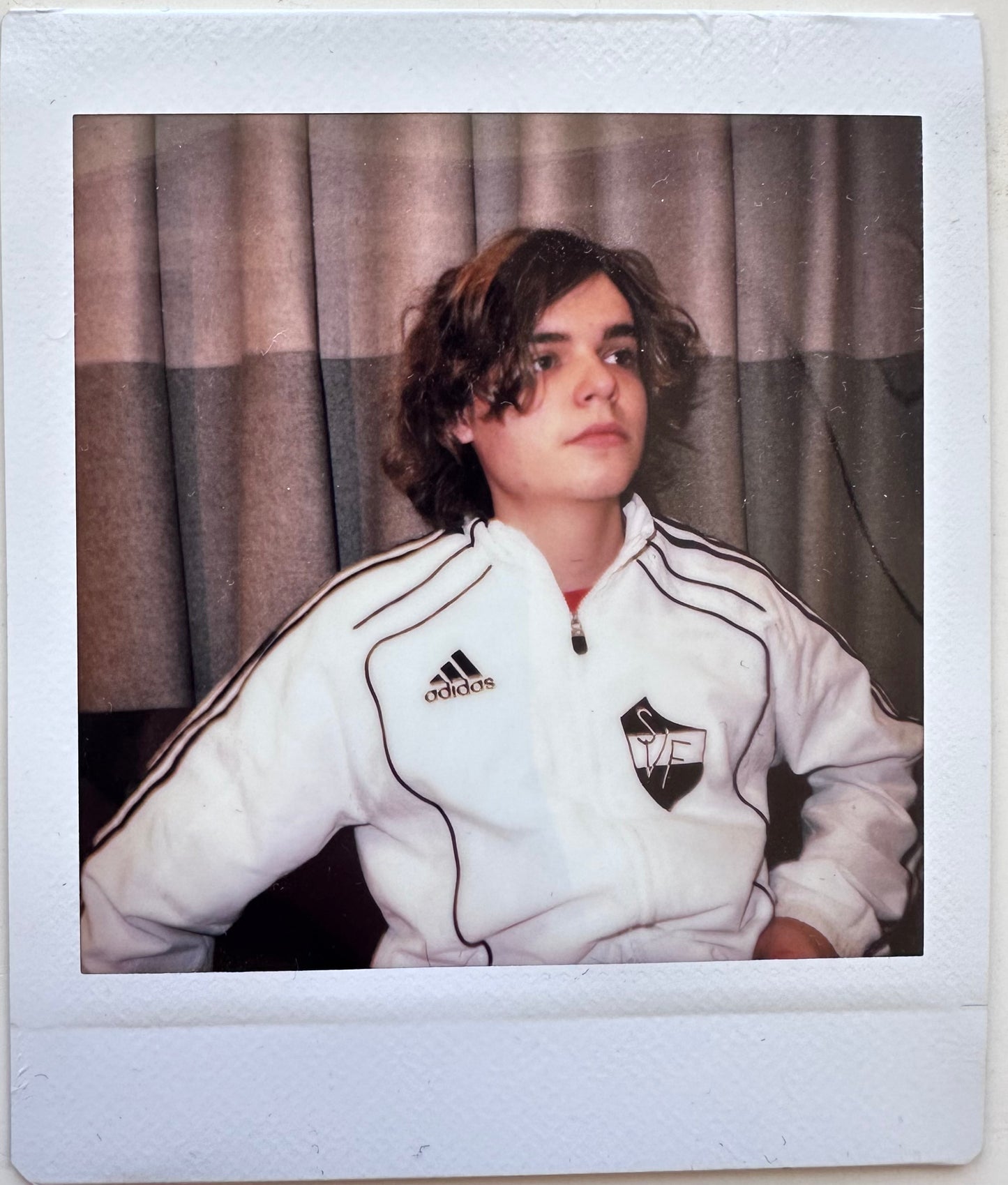 ONE UNIQUE SIGNED POLAROID PHOTO