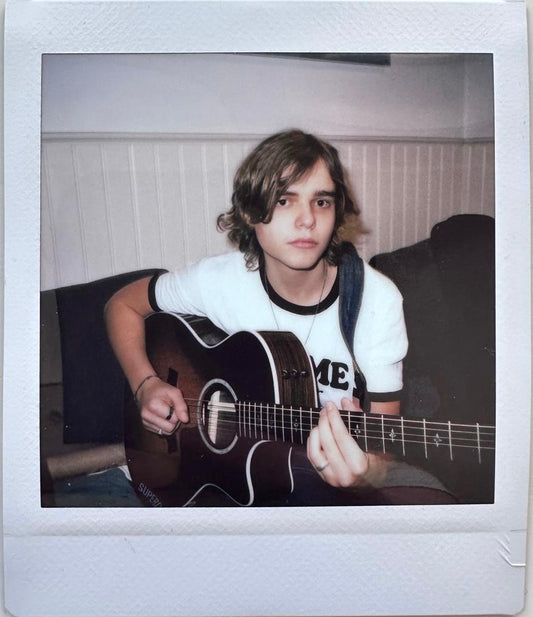 ONE UNIQUE SIGNED POLAROID PHOTO