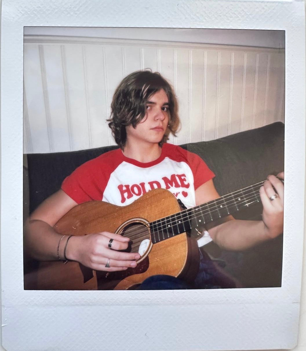 ONE UNIQUE SIGNED POLAROID PHOTO