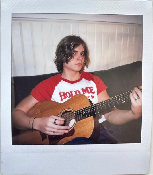 ONE UNIQUE SIGNED POLAROID PHOTO