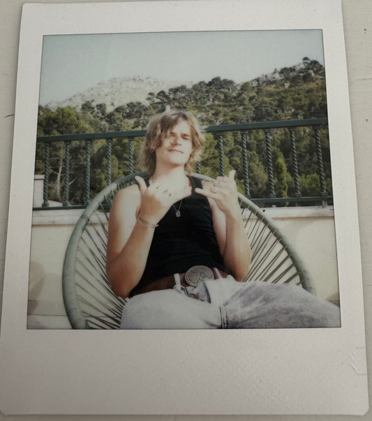 ONE UNIQUE SIGNED POLAROID PHOTO