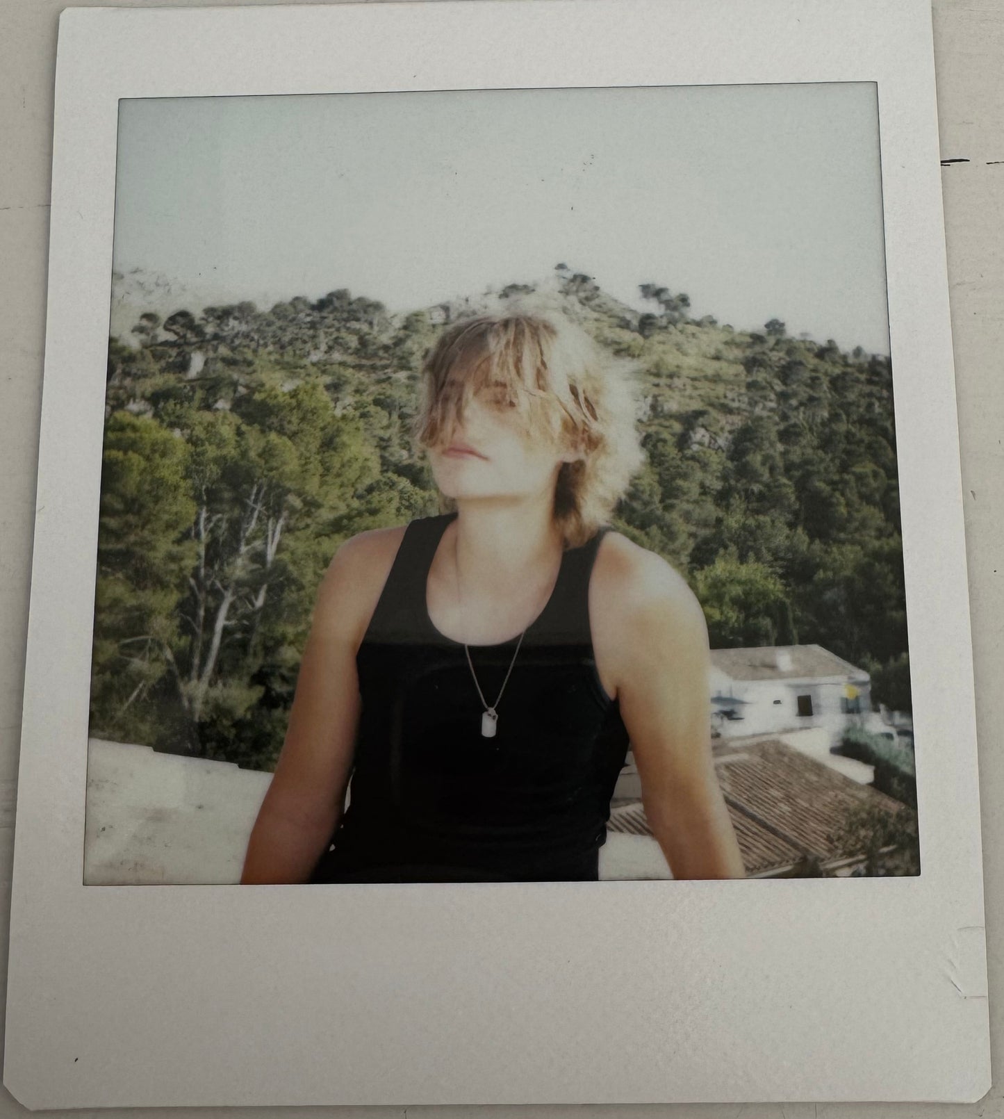 ONE UNIQUE SIGNED POLAROID PHOTO