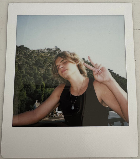 ONE UNIQUE SIGNED POLAROID PHOTO