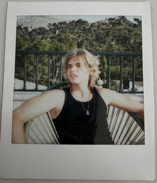 ONE UNIQUE SIGNED POLAROID PHOTO