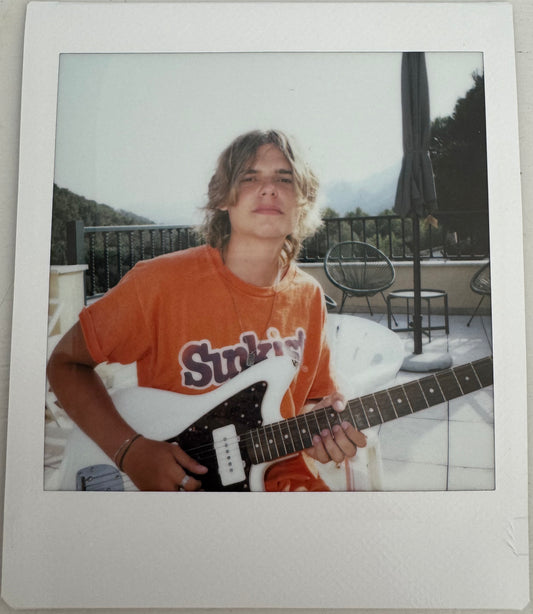 ONE UNIQUE SIGNED POLAROID PHOTO