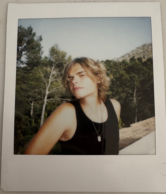 ONE UNIQUE SIGNED POLAROID PHOTO