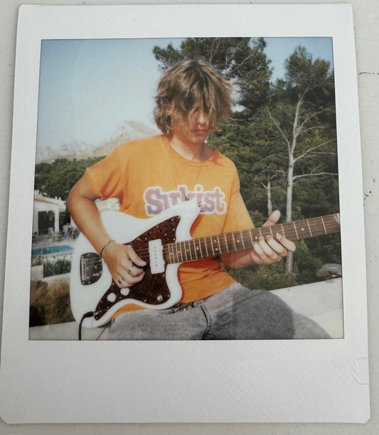 ONE UNIQUE SIGNED POLAROID PHOTO