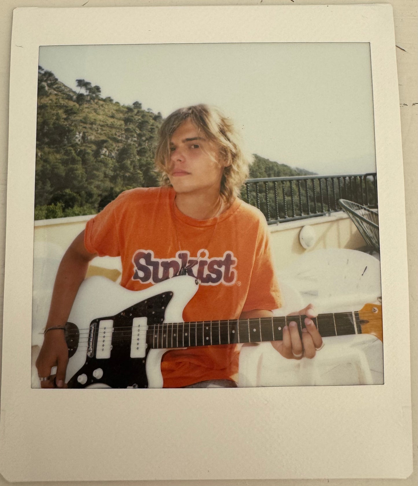 ONE UNIQUE SIGNED POLAROID PHOTO