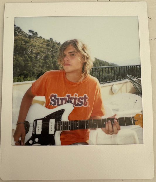 ONE UNIQUE SIGNED POLAROID PHOTO
