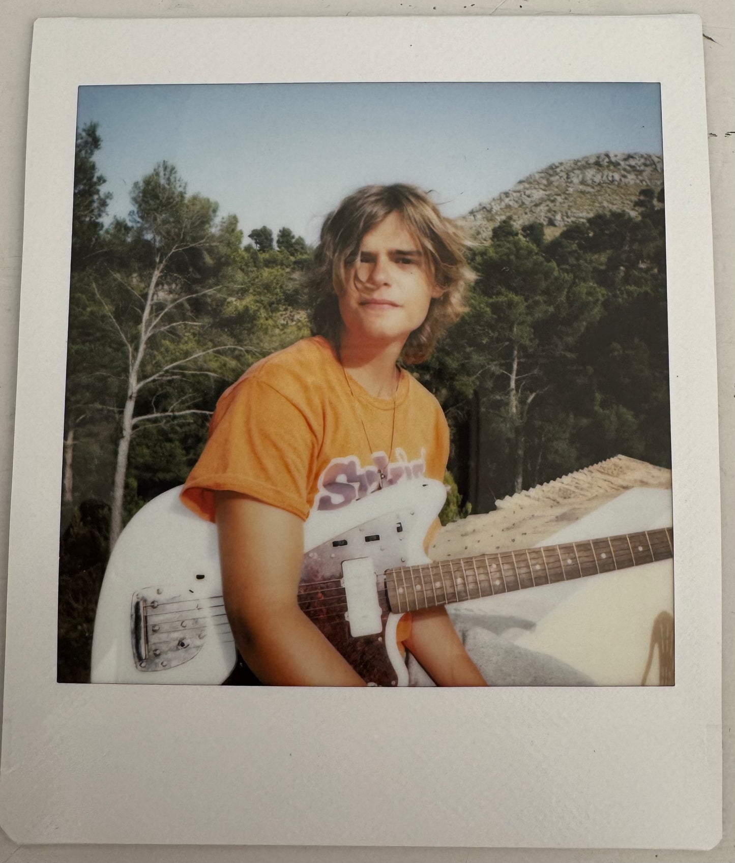 ONE UNIQUE SIGNED POLAROID PHOTO