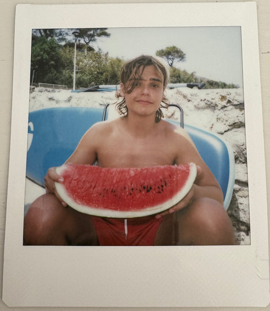 ONE UNIQUE SIGNED POLAROID PHOTO