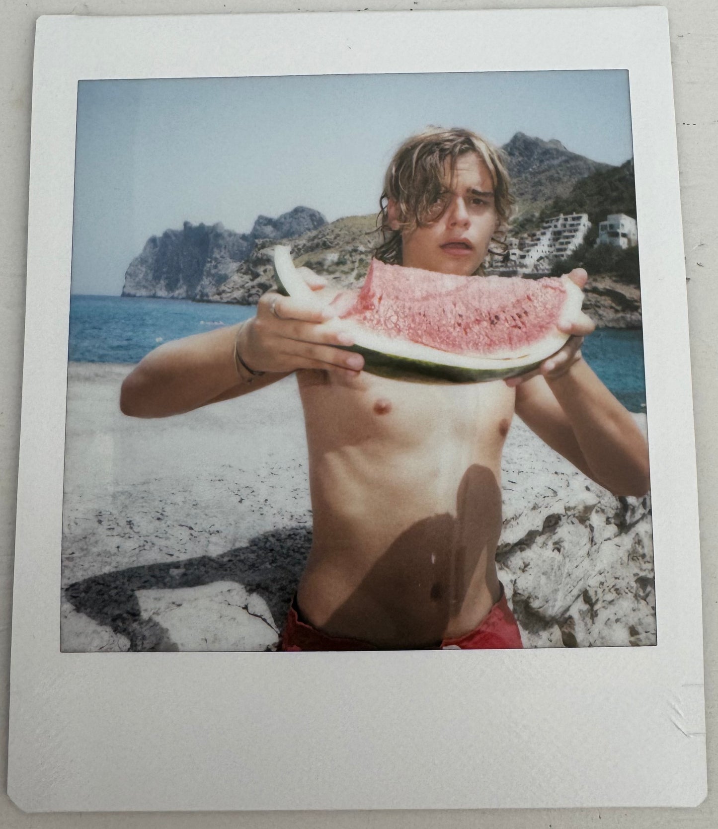 ONE UNIQUE SIGNED POLAROID PHOTO