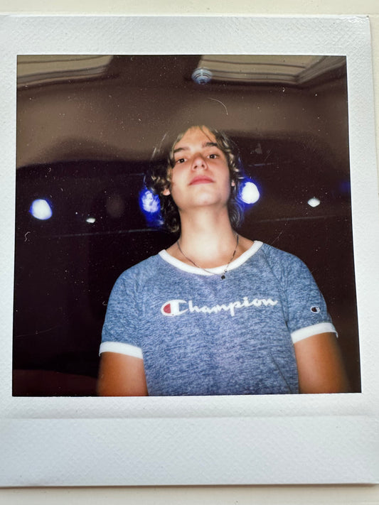 ONE UNIQUE SIGNED POLAROID PHOTO