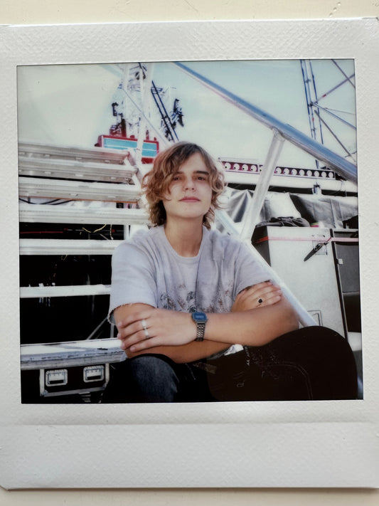 ONE UNIQUE SIGNED POLAROID PHOTO