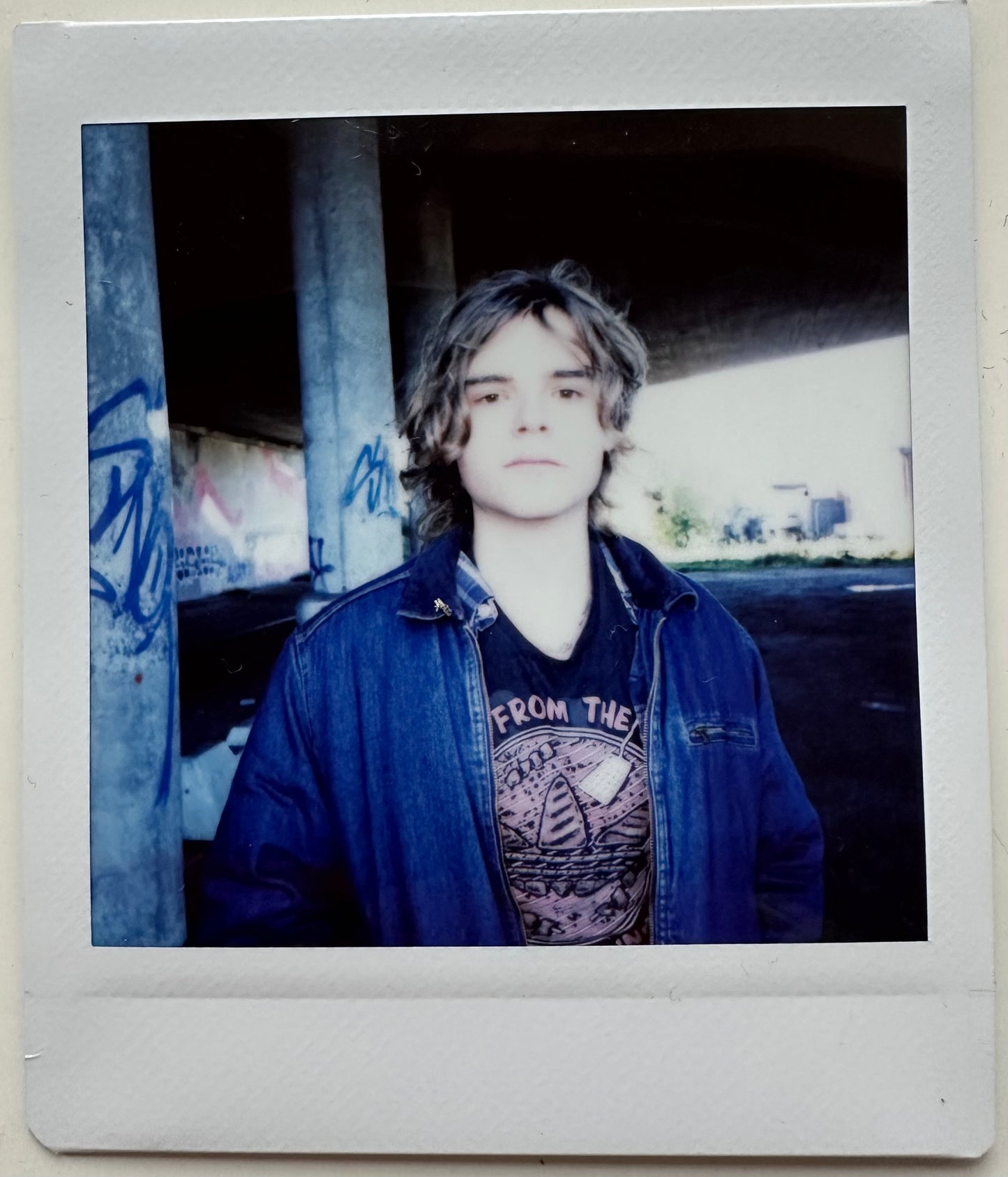 ONE UNIQUE SIGNED POLAROID PHOTO