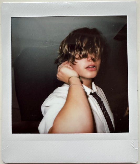 ONE UNIQUE SIGNED POLAROID PHOTO