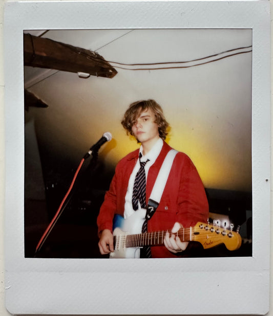 ONE UNIQUE SIGNED POLAROID PHOTO