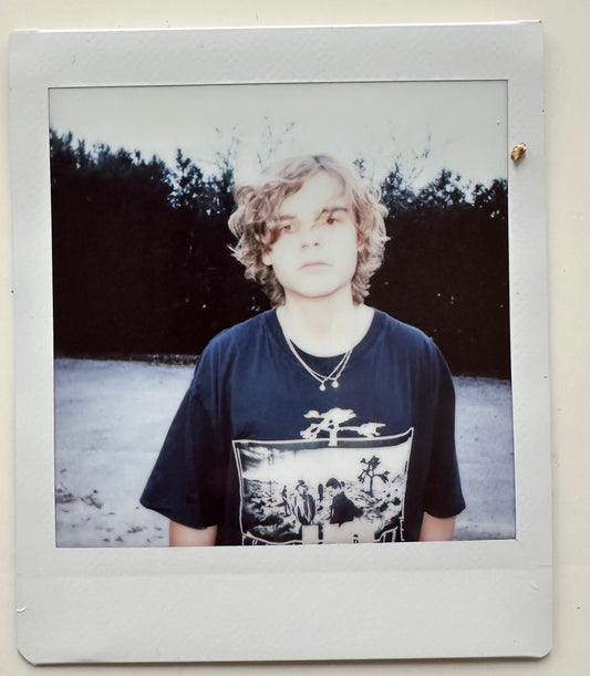 ONE UNIQUE SIGNED POLAROID PHOTO