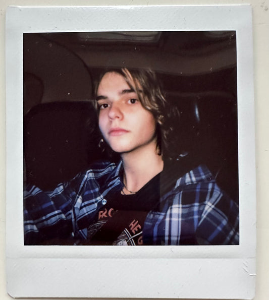 ONE UNIQUE SIGNED POLAROID PHOTO