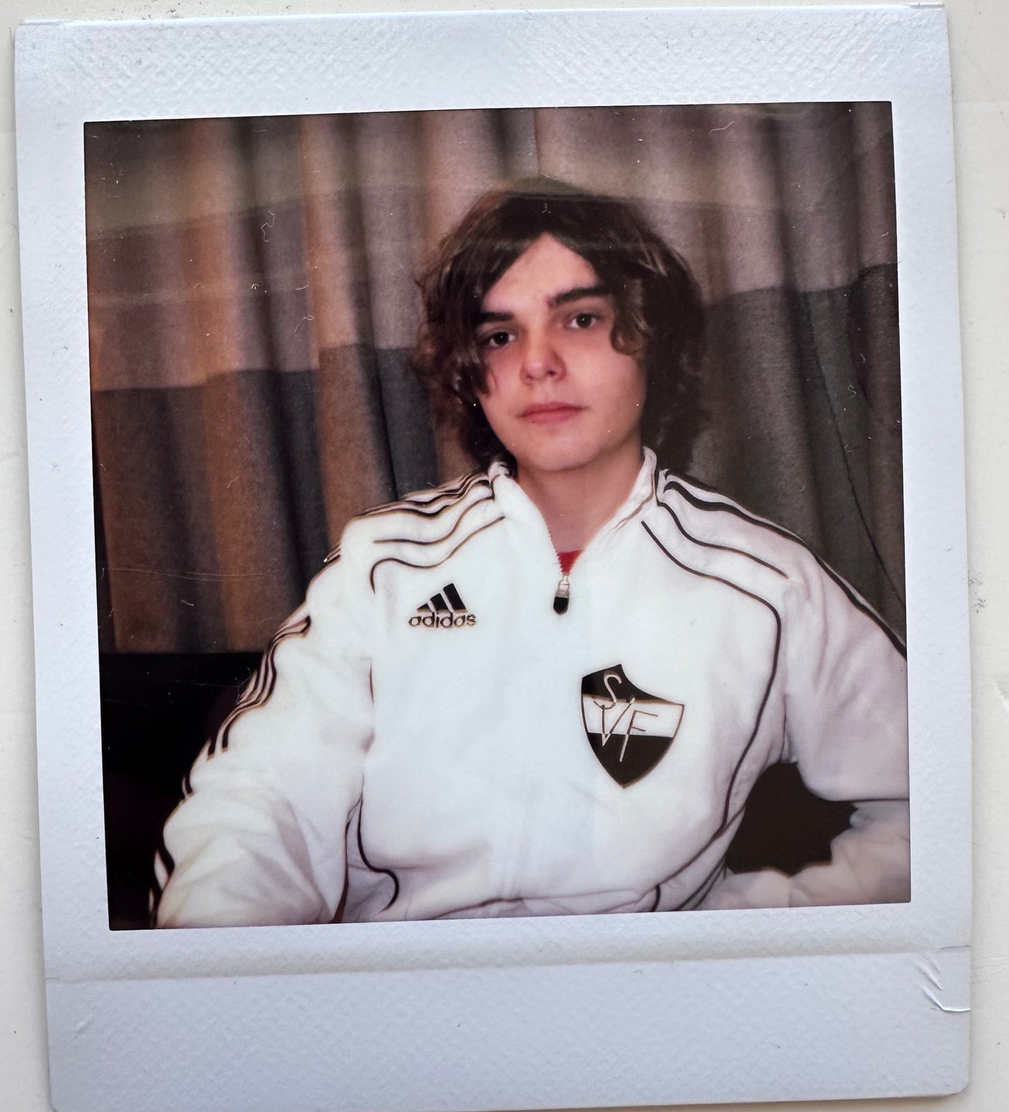 ONE UNIQUE SIGNED POLAROID PHOTO