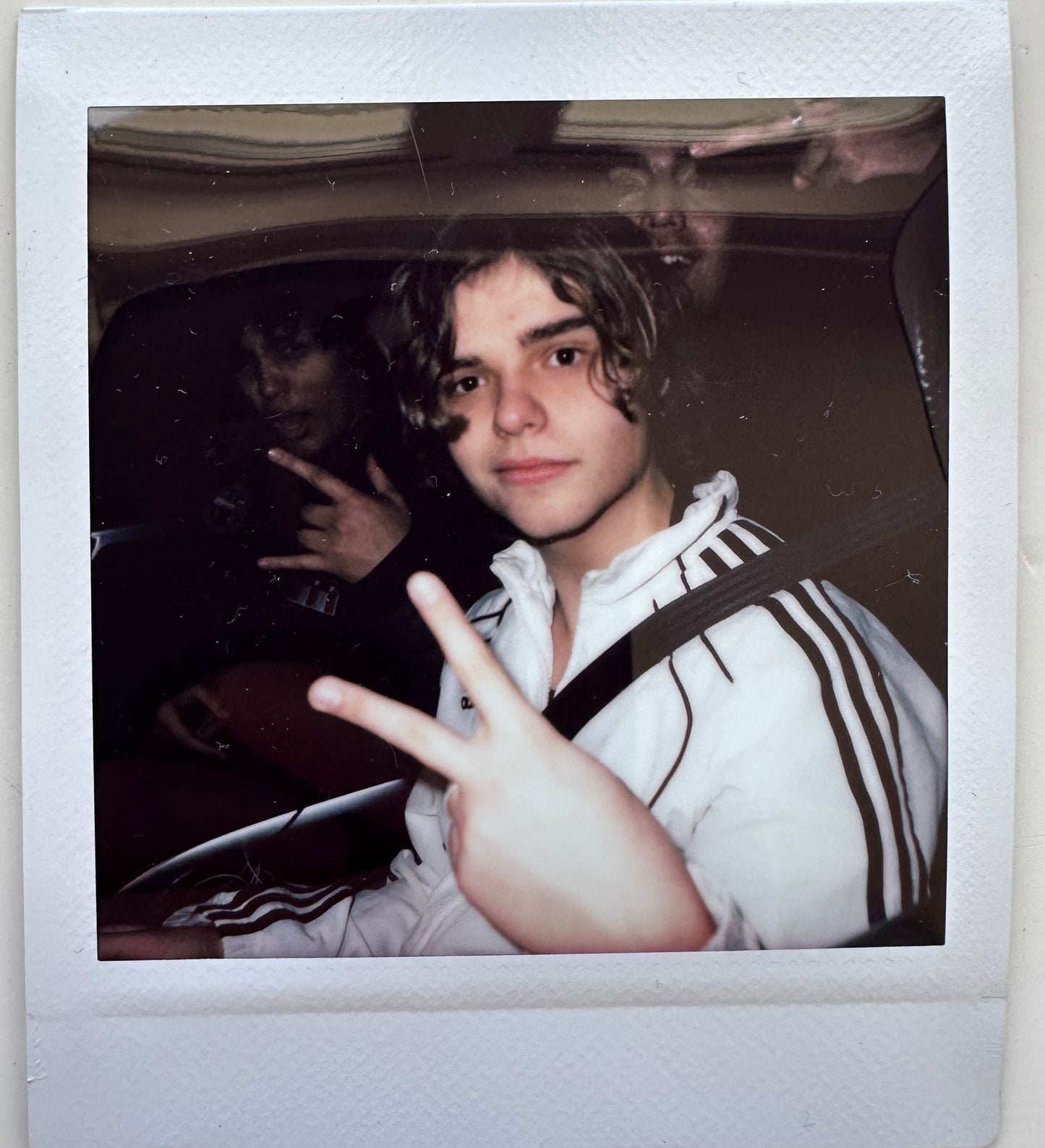 ONE UNIQUE SIGNED POLAROID PHOTO