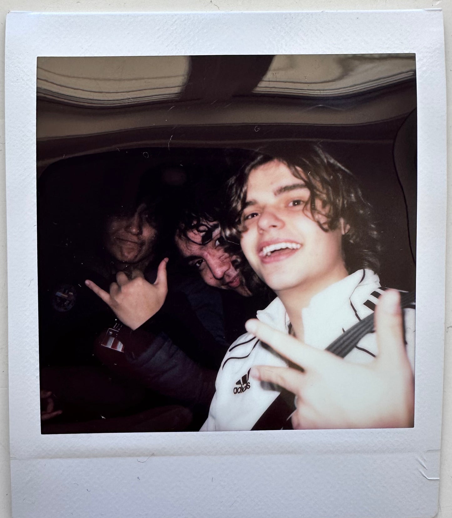 ONE UNIQUE SIGNED POLAROID PHOTO