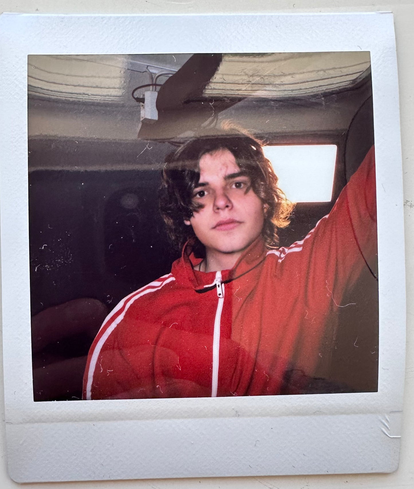 ONE UNIQUE SIGNED POLAROID PHOTO