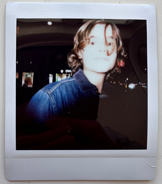 ONE UNIQUE SIGNED POLAROID PHOTO