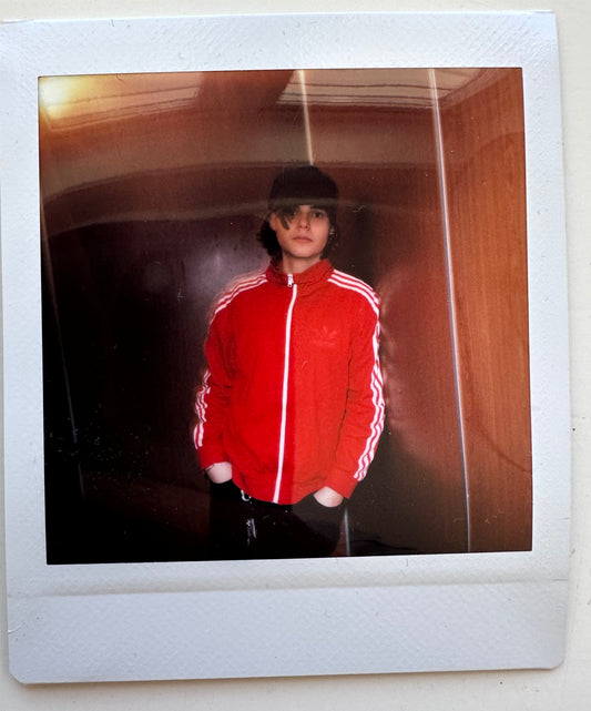 ONE UNIQUE SIGNED POLAROID PHOTO