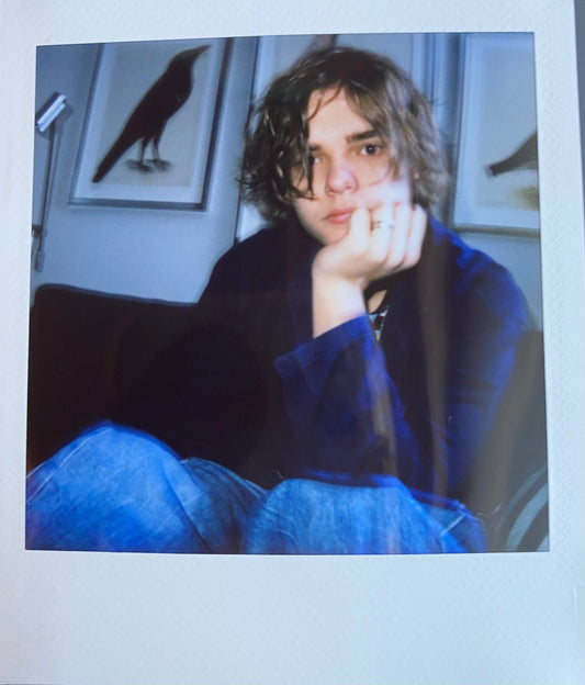 ONE UNIQUE SIGNED POLAROID PHOTO