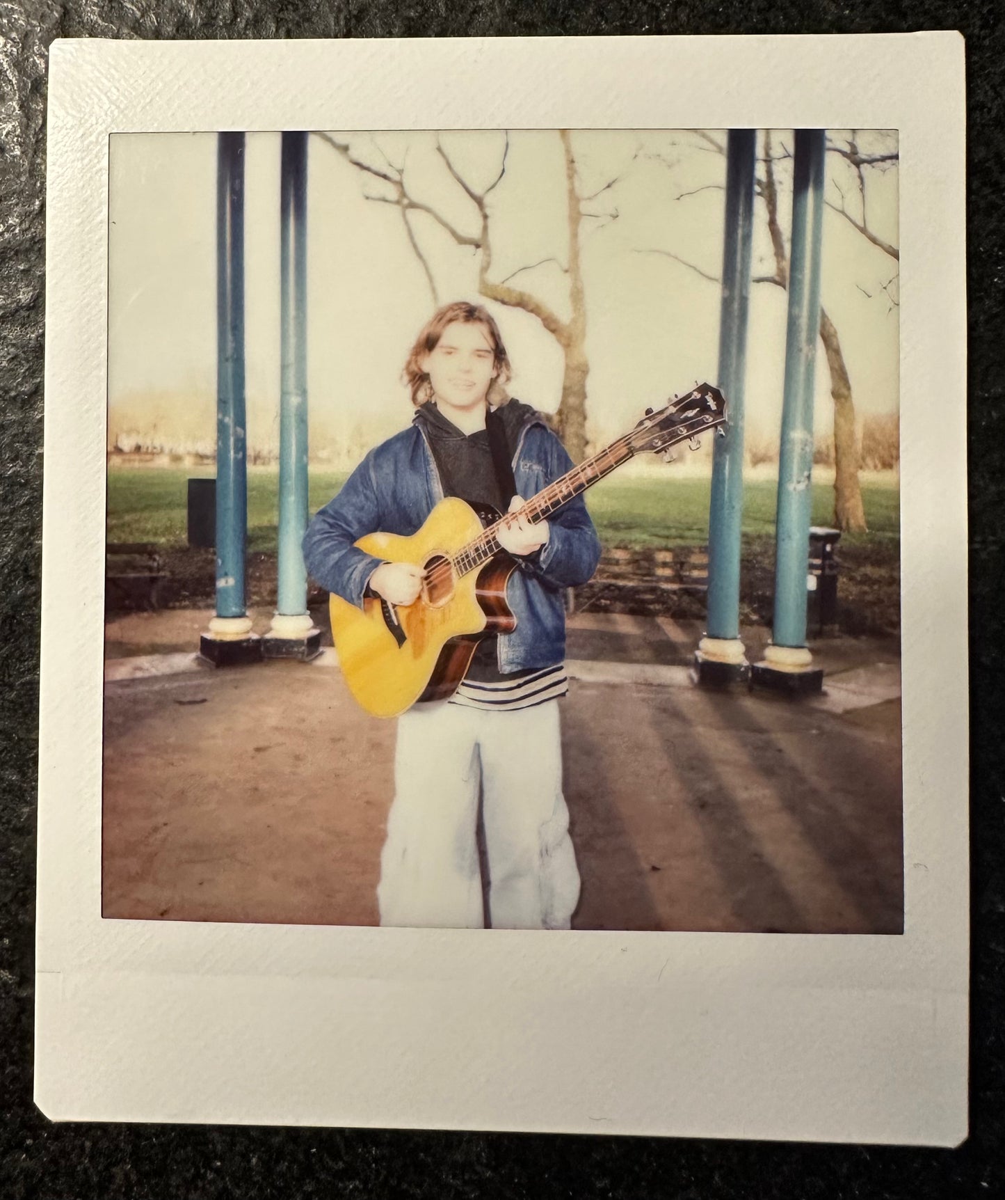 ONE UNIQUE SIGNED POLAROID PHOTO