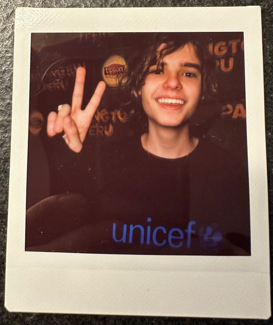 ONE UNIQUE SIGNED POLAROID PHOTO