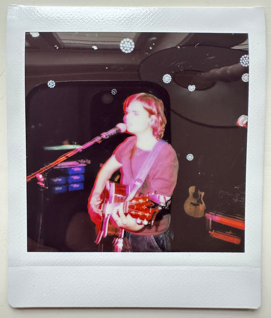 ONE UNIQUE SIGNED POLAROID PHOTO