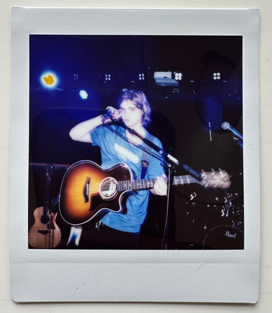 ONE UNIQUE SIGNED POLAROID PHOTO