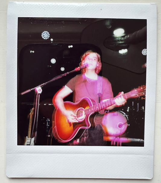 ONE UNIQUE SIGNED POLAROID PHOTO