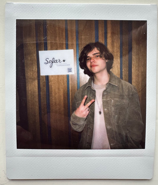 ONE UNIQUE SIGNED POLAROID PHOTO