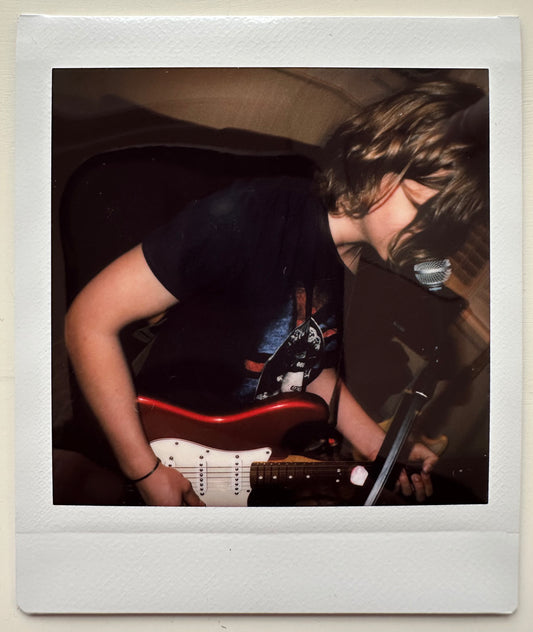 ONE UNIQUE SIGNED POLAROID PHOTO