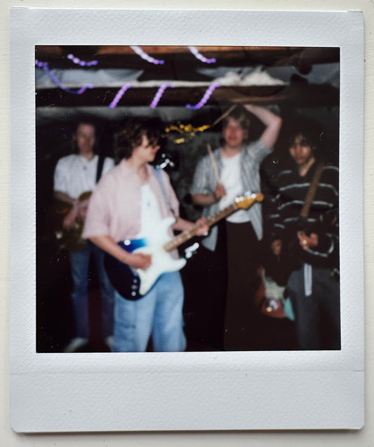 ONE UNIQUE SIGNED POLAROID PHOTO