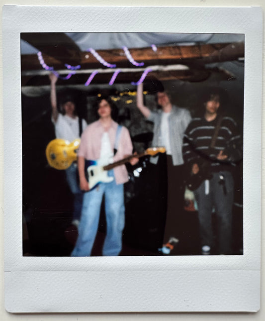 ONE UNIQUE SIGNED POLAROID PHOTO