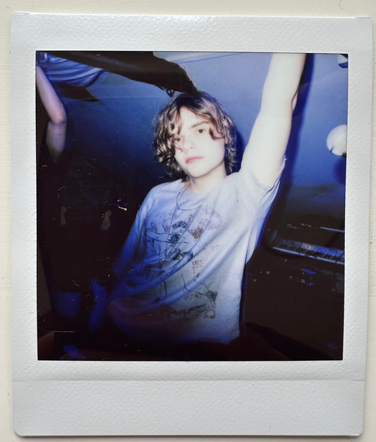 ONE UNIQUE SIGNED POLAROID PHOTO