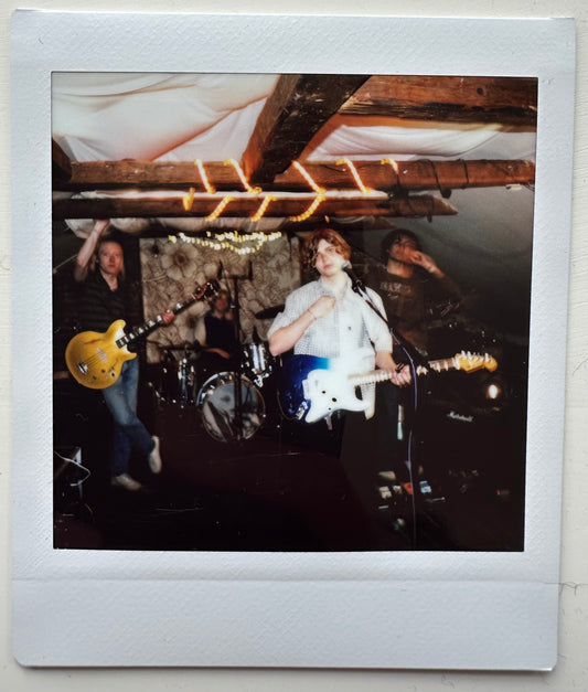 ONE UNIQUE SIGNED POLAROID PHOTO