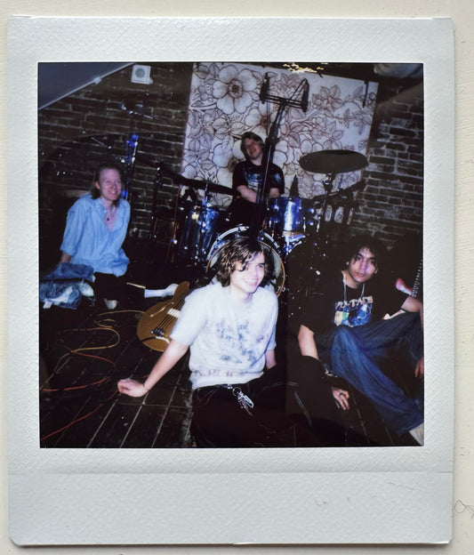 ONE UNIQUE SIGNED POLAROID PHOTO