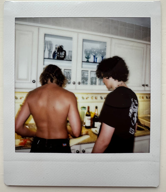 ONE UNIQUE SIGNED POLAROID PHOTO