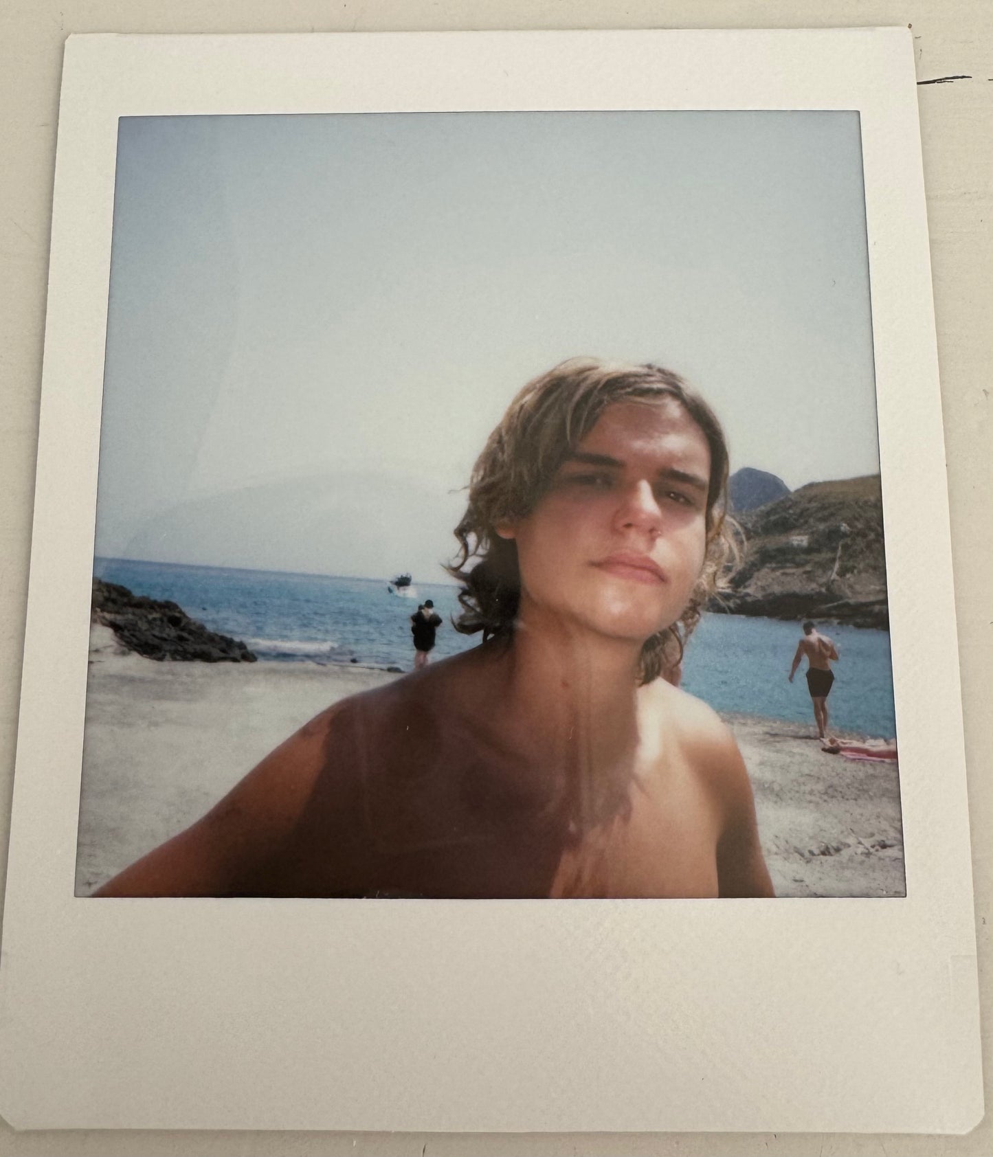 ONE UNIQUE SIGNED POLAROID PHOTO